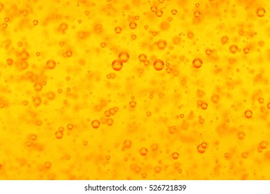 Golden Liquid Soap Bubbles As Background