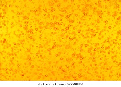 Golden Liquid Soap Bubbles As Background