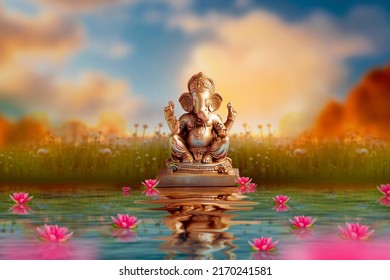 Golden lord ganesha sculpture on nature background. celebrate lord ganesha festival. - Shutterstock ID 2170241581