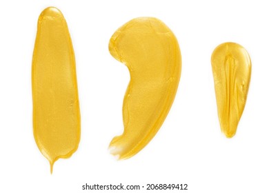 Golden Makeup On A White Background With A Brush