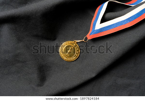 golden medal for the first place reward, success\
at the competition\
concept
