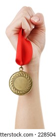 Golden Medal In Hand Isolated On White