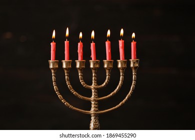 Golden Menorah With Burning Candles On Blurred Background