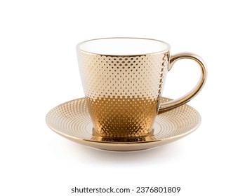 Golden metallic tea cup with saucer isolated on white background with clipping path