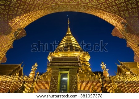 the golden pagoda in twilight of wat phra that doi suthep . The most famous temple in chiangmai ,Thailand