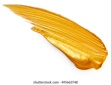 Golden paint stroke isolated on white background