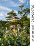 Golden Pavilion (Kinkaku-ji) Reflected in the Pond in Kyoto, Japan The Golden Pavilion, also known as Kinkaku-ji, is a Zen Buddhist temple in Kyoto. The golden structure is reflected in the calm water