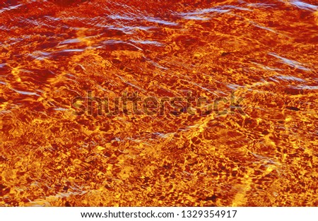 Golden and red glowing lava texture background