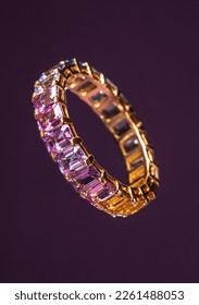 Golden ring with precious stones. Diamonds and precious stones. Macro - Shutterstock ID 2261488053