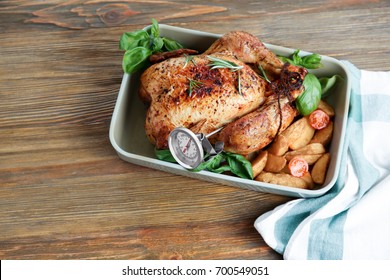 Golden Roasted Turkey With Meat Thermometer On Table