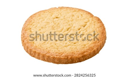 Golden round buttery shortbread cookie with textured surface
