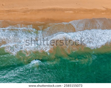 Similar – Image, Stock Photo Aerial perspective of textured desert terrain with intricate erosion patterns and trails in Utah, exhibiting a blend of golden and grey hues