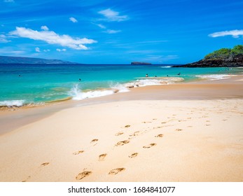 Golden sand of Big Beach in Maui Hawaii. Big Beach is also known by the names Makena Beach and Oneloa Beach, waves often big, and powerful.