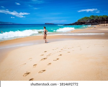 Golden sand of Big Beach in Maui Hawaii. Big Beach is also known by the names Makena Beach and Oneloa Beach, waves often big, and powerful.