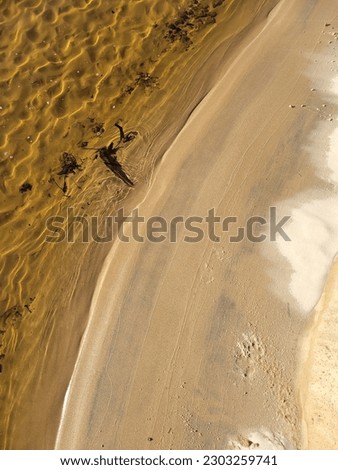 Golden Sandy Creek glistening in the sun