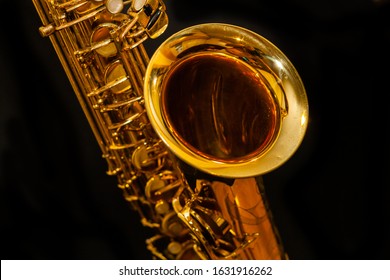 Golden Saxophone On Black Background