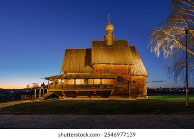 Golden Serenity: A Rustic Wooden Church Silhouetted Against a Stunning Sunset Canvas - Powered by Shutterstock