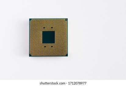 The golden side of the computer processor. Isolated