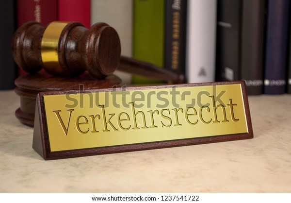 Golden Sign with gavel with german word for\
traffic law -\
Verkehrsrecht