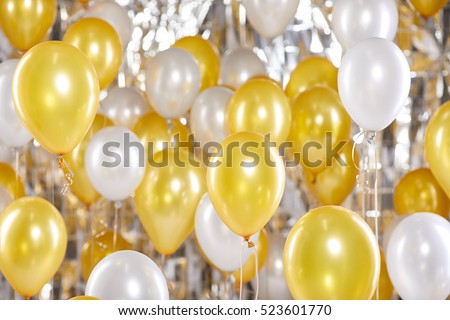 Golden and silver balloons background. New Year concept 