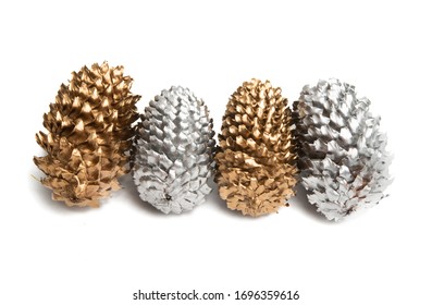 Golden And Silver Pine Cones Isolated On White Background