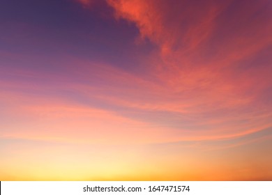 Golden sky and golden clouds after sunset - Shutterstock ID 1647471574
