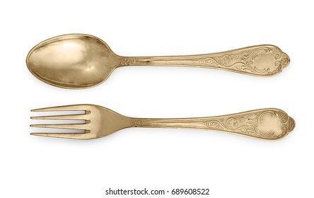 Golden spoon and fork isolated on a white background.