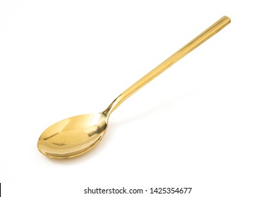 golden spoon isolated on a white background