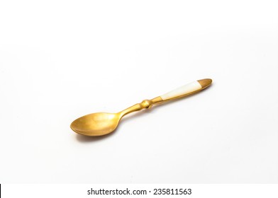 Golden Spoon With White Background