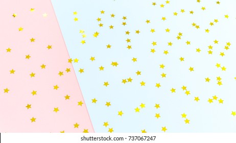 Golden Star Sprinkles On Double Pink And Blue. Festive Holiday Background. Celebration Concept. Top View, Flat Lay. Horizontal, Wide Screen Format