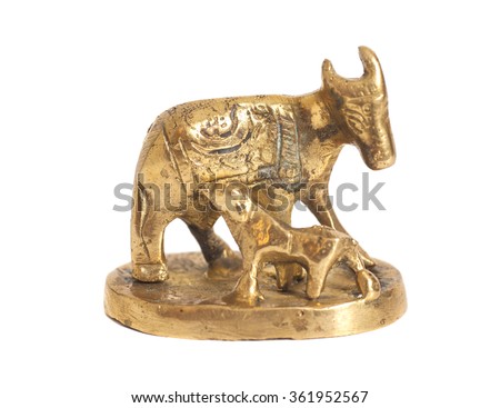 Golden statue cow and calf isolated on white