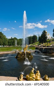 Golden Statue Of Samson On Small Stone Island In Lower Park Of Peterhof. Saint Petersburg. Russia