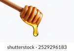 golden stream of viscous honey cascades down a rustic wooden dipper, glistening isolated white background 