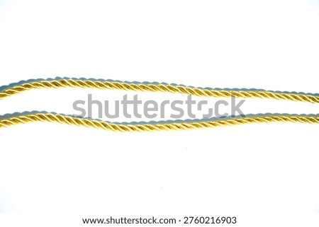 Golden string, set rope hanging isolated on white, clipping path