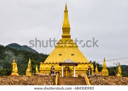 Golden stupa in the village Luang Nam Tha, Northern Laos