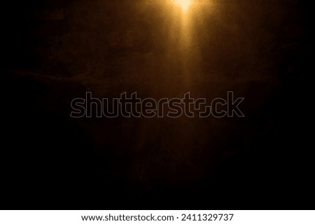 golden sun light effect. Glowing sunrays on black background. Light rays or sun beam vector background. Abstract gold light sparkle flash spotlight backdrop with yellow, gold sunlight shine on black 