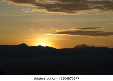 Golden Sunrise From Behind The Hill, Clear Morning Sky