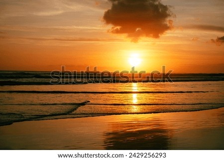 Golden sunset on the beach in Bali