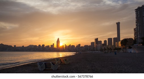 Golden sunset on the Poniente beach in Benidorm - Shutterstock ID 567378766