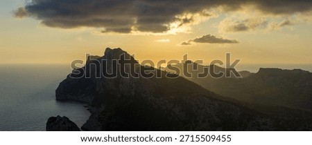 Golden sunset over the cliffs of Cap de Formentor, Mallorca, Spain. Breathtaking Mediterranean landscape with sun rays over the rocky coast — captured in stunning high resolution.