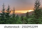 A golden sunset over the Smoky Mountains from Clingmans Dome, Great Smoky Mountain National Park, North Carolina.