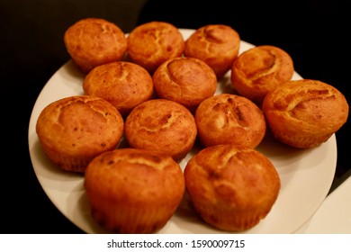 Golden Sweet Homemade And Freshly Baked Cornbread Stuffing Shape Of Muffins For Lunch On Stovetop In Kitchen, Close Up. Corn Pone For Holidays, Healthy Meal. Food Of Christmas And New Year.