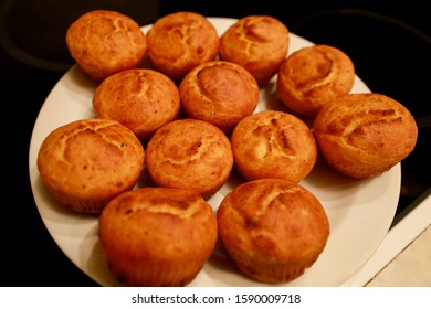 Golden Sweet Homemade And Freshly Baked Cornbread Stuffing Shape Of Muffins For Lunch On Stovetop In Kitchen, Close Up. Corn Pone For Holidays, Healthy Meal. Food Of Christmas And New Year.