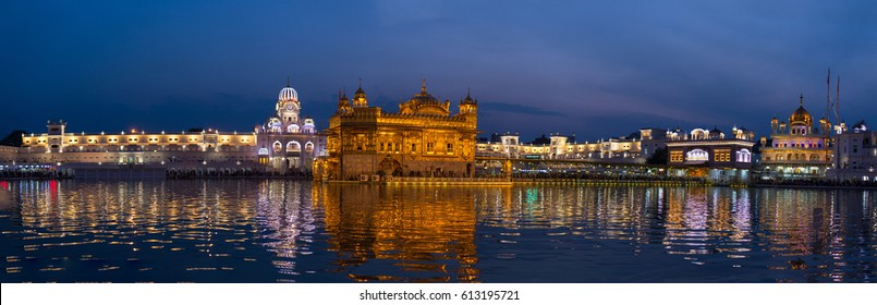 The Golden Temple at Amritsar, Punjab, India, the most sacred icon and worship place of Sikh religion. Illuminated in the night, reflected on lake.

