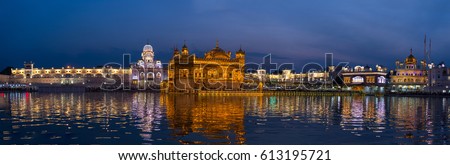 The Golden Temple at Amritsar, Punjab, India, the most sacred icon and worship place of Sikh religion. Illuminated in the night, reflected on lake.
