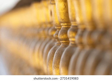 Golden temple pillars with a gradient of sharpness