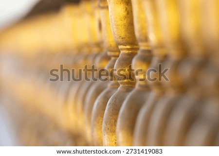 Golden temple pillars with a gradient of sharpness