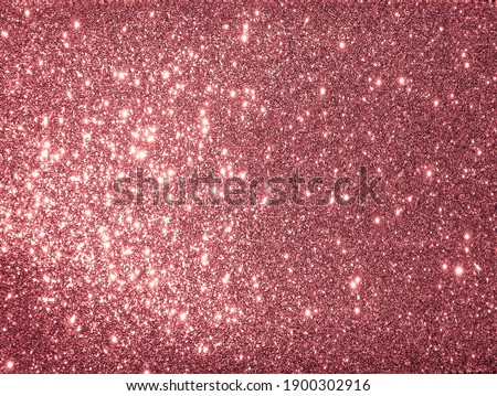 Golden Textured Shimmer Background texture.Pink Glitter Selective Focus.Frame design.Decoration.Decor.Holidays.Gift card. Invitations.New Year. Merry Christmas.Birthday.Wedding.Wallpaper. Banner.     