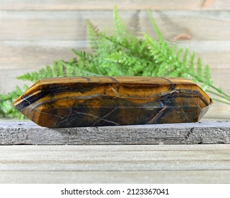 Golden Tiger Eye Crystal Wand With Zen Background