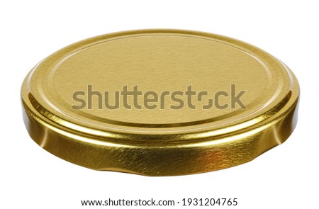 Golden tin screw lid for glass jar isolated on white background
